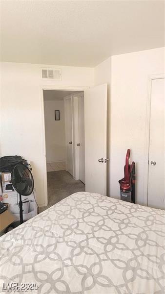 bedroom with visible vents