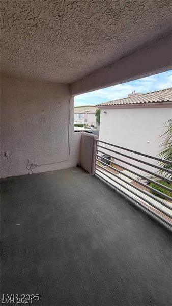 exterior space with a textured ceiling