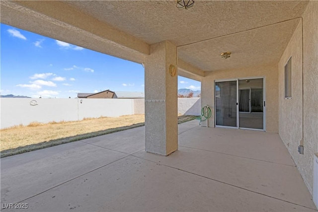 view of patio with a fenced backyard