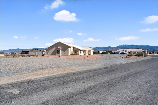 exterior space featuring a mountain view