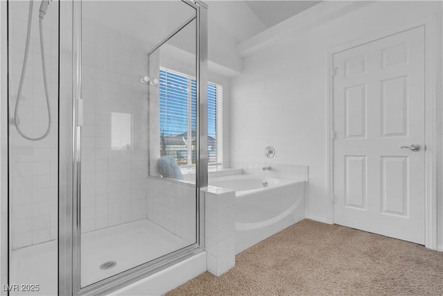 bathroom featuring carpet flooring, a shower stall, and a bath