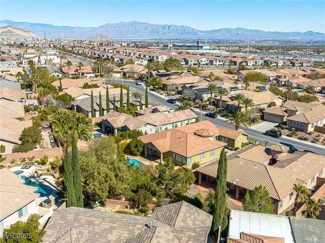 drone / aerial view with a mountain view and a residential view