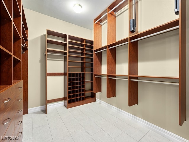 walk in closet featuring tile patterned floors