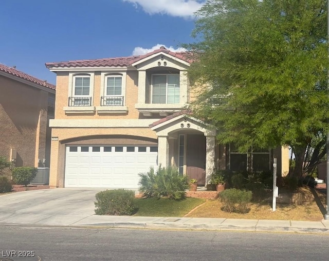 8494 Langhorne Creek St, Las Vegas, NV 89139 - view of front facade featuring concrete driveway, an attached garage, a tile roof, and stucco siding