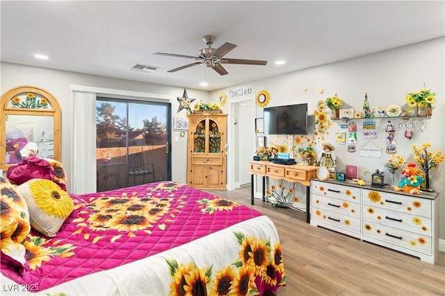 bedroom featuring ceiling fan, recessed lighting, wood finished floors, visible vents, and access to outside