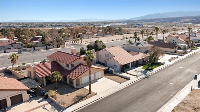 aerial view with a residential view and a mountain view