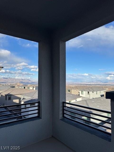 balcony featuring a residential view