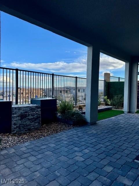 view of patio / terrace with fence