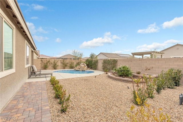 view of swimming pool featuring a patio, a fenced backyard, and a fenced in pool