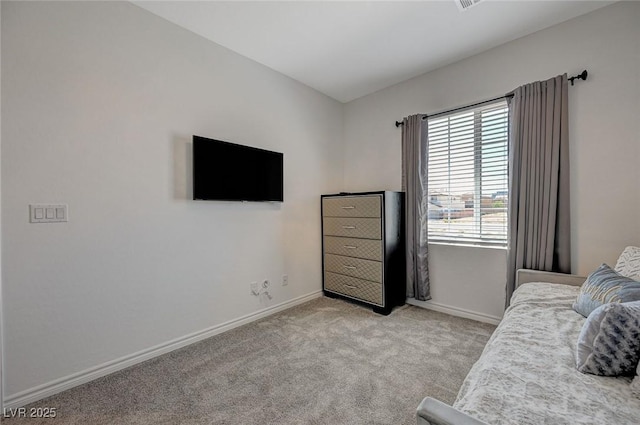 bedroom with baseboards and carpet flooring