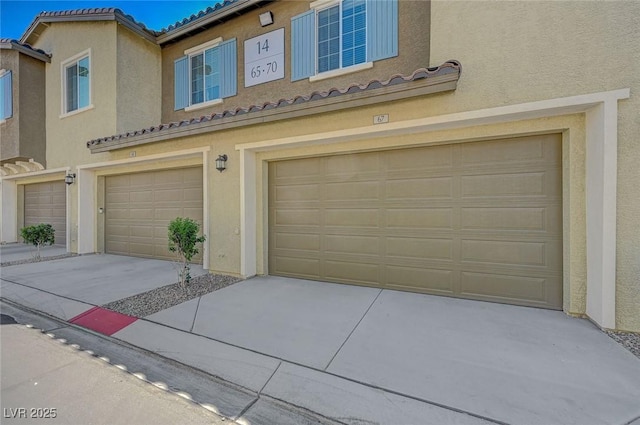 garage with driveway