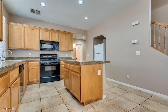 kitchen with a kitchen island, light tile patterned flooring, a sink, and black appliances