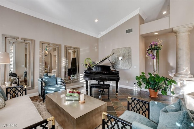 living room with arched walkways, crown molding, ornate columns, visible vents, and baseboards