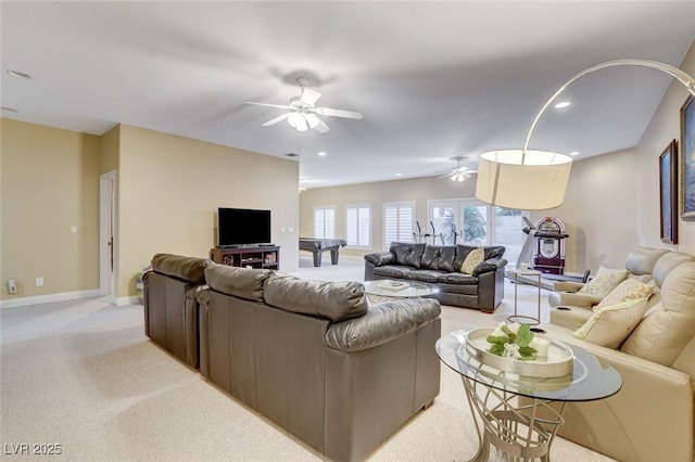 living area with light carpet, ceiling fan, baseboards, and recessed lighting