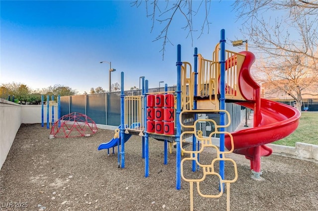 community playground featuring fence