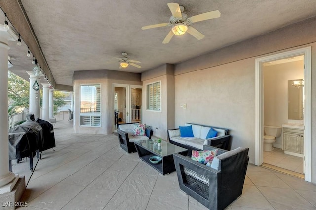 view of patio / terrace featuring ceiling fan and an outdoor hangout area