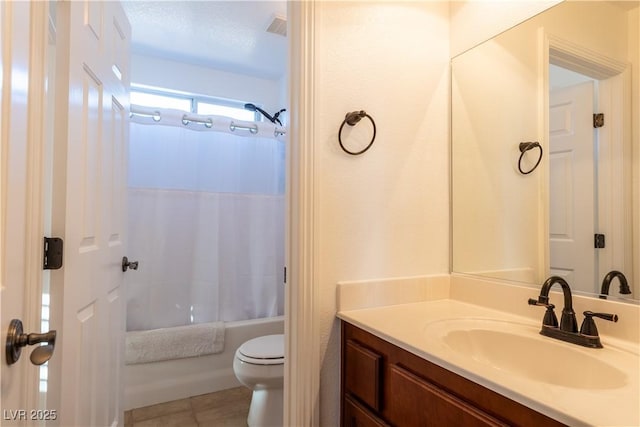 bathroom featuring tile patterned flooring, toilet, visible vents, bathing tub / shower combination, and vanity