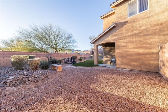 view of yard with a patio area and fence