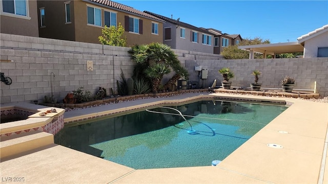 view of swimming pool featuring a fenced in pool and a fenced backyard