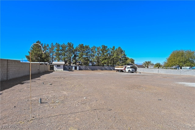 view of yard with fence