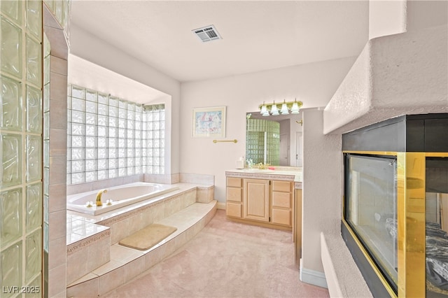 full bath featuring a bath, a shower, vanity, and visible vents