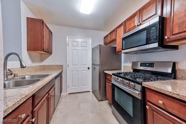 kitchen with stainless steel appliances and a sink