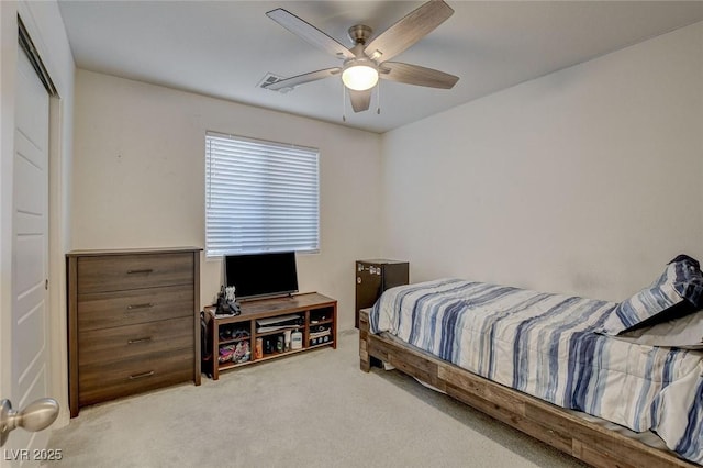 bedroom with ceiling fan, carpet flooring, and visible vents