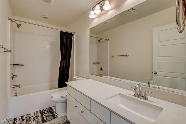 bathroom featuring toilet, visible vents, vanity, tile patterned floors, and shower / tub combo with curtain