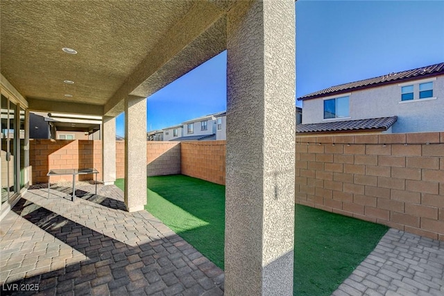 view of patio with a fenced backyard