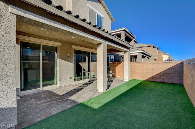 view of patio with fence