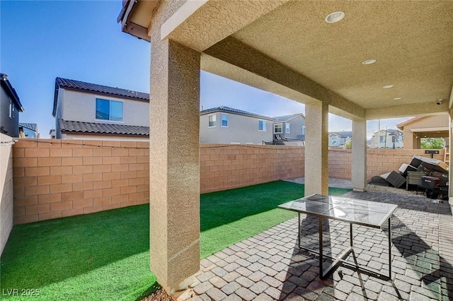 view of patio with a fenced backyard