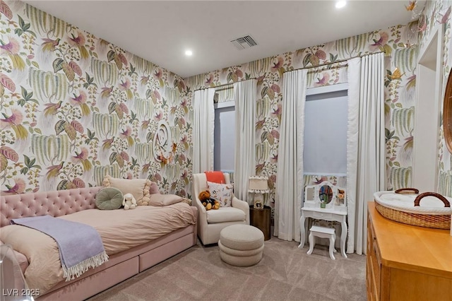 bedroom with recessed lighting, light colored carpet, visible vents, and wallpapered walls