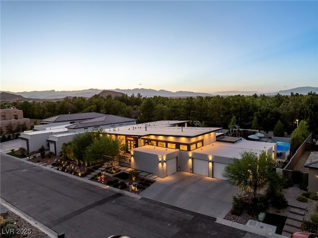 aerial view at dusk with a mountain view