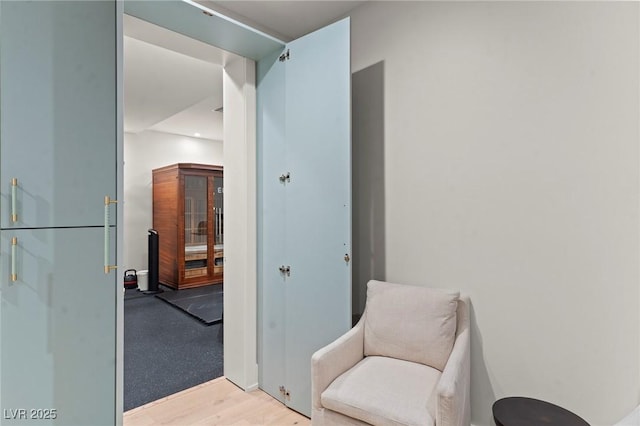 sitting room with light wood-type flooring