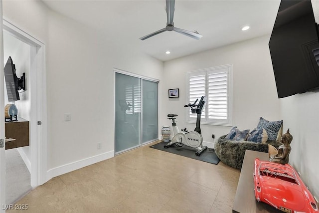 exercise area with ceiling fan, baseboards, and recessed lighting