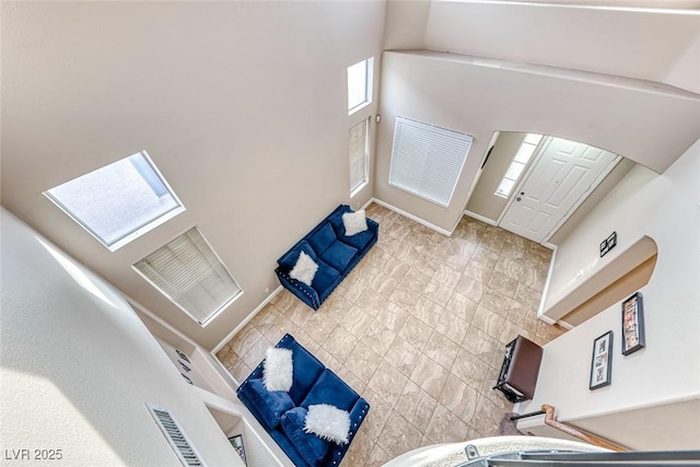 entryway featuring visible vents and baseboards