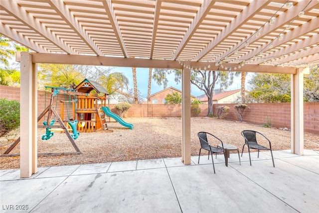 exterior space featuring a fenced backyard, a playground, and a pergola