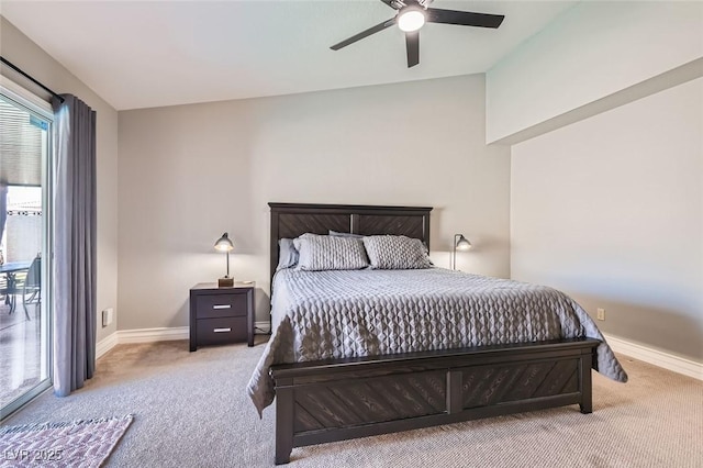 carpeted bedroom featuring baseboards and a ceiling fan