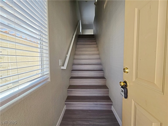 stairway with baseboards