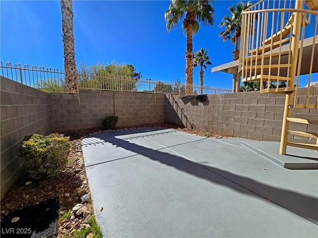 view of patio with a fenced backyard