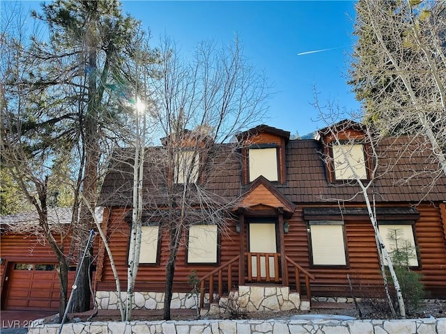 view of log-style house