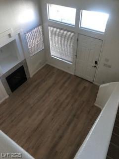 entryway with wood finished floors