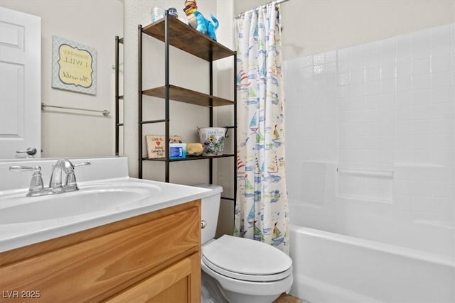 bathroom featuring shower / tub combo, vanity, and toilet