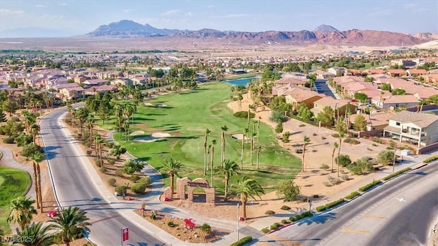 bird's eye view featuring a residential view, a mountain view, and golf course view