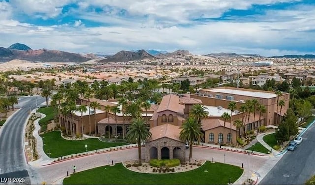 aerial view featuring a mountain view and a residential view