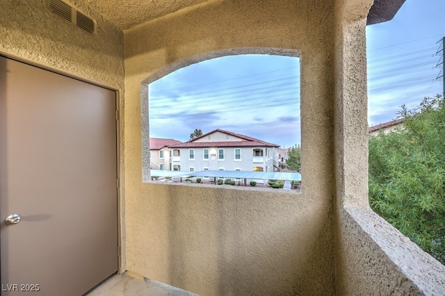 balcony featuring visible vents