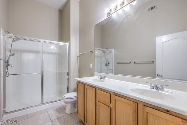 full bath featuring tile patterned flooring, visible vents, a sink, and a shower stall