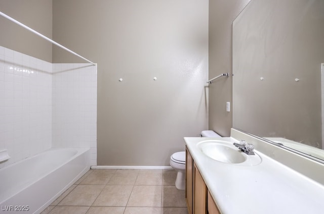 full bathroom with bathtub / shower combination, tile patterned flooring, toilet, vanity, and baseboards