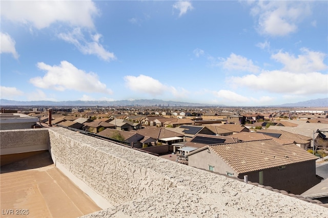 exterior space with a residential view and a mountain view