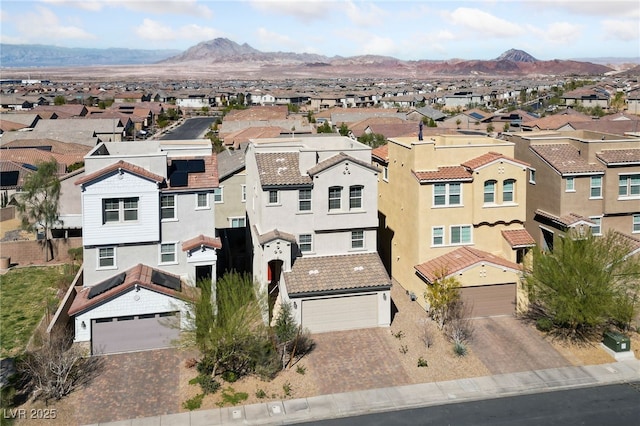 bird's eye view featuring a residential view and a mountain view